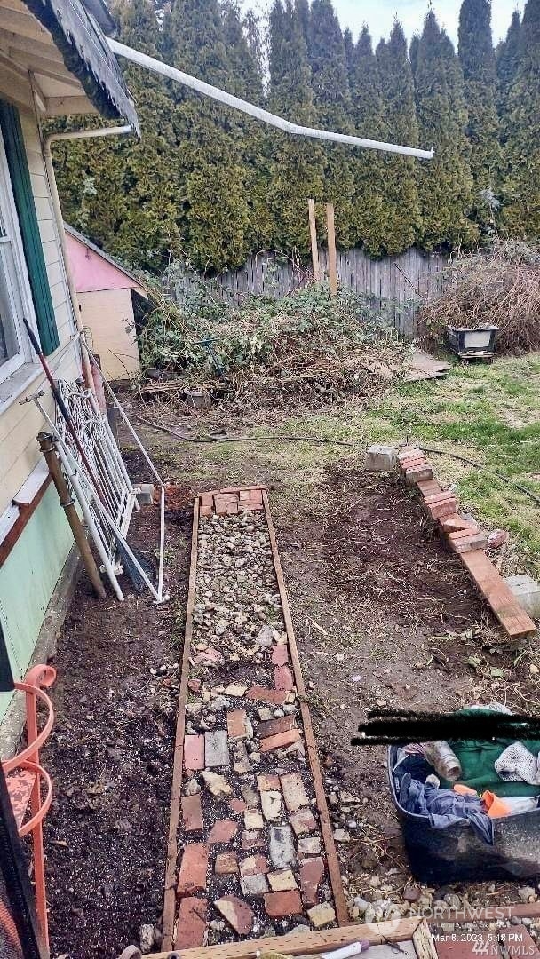 23304 Bothell Everett Highway Bothell, WA 98021 - Photo 28 of 35 a view of a backyard with wooden fence
