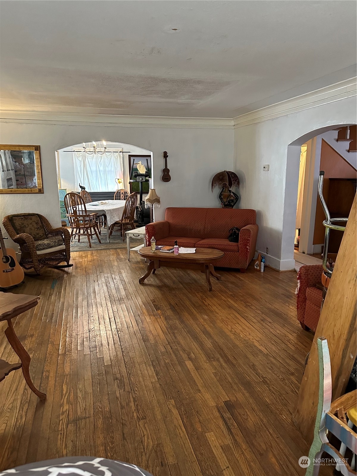 23304 Bothell Everett Highway Bothell, WA 98021 - Photo 7 of 35 a living room with furniture and a wooden floor