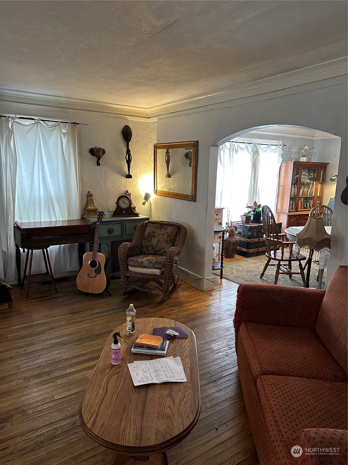 23304 Bothell Everett Highway Bothell, WA 98021 - Photo 8 of 35 a living room with furniture and a wooden floor