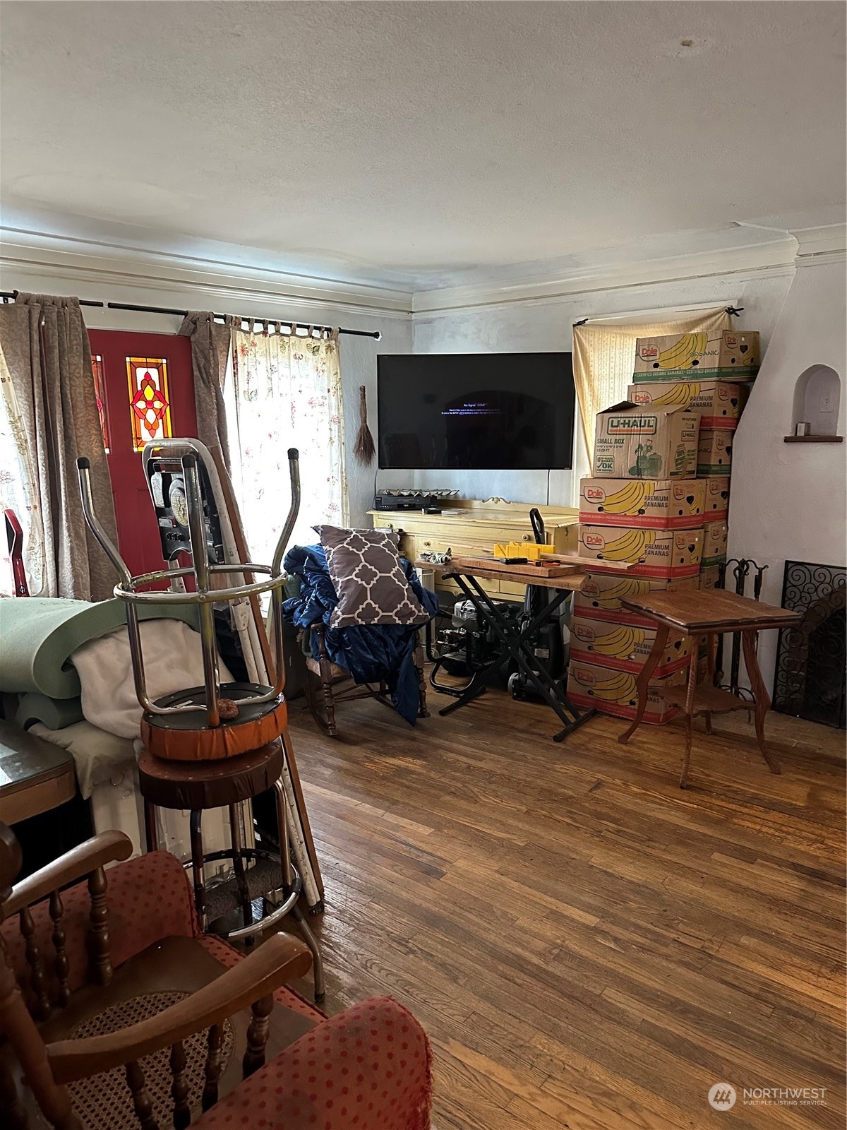 23304 Bothell Everett Highway Bothell, WA 98021 - Photo 10 of 35 a view of a livingroom with furniture and a window