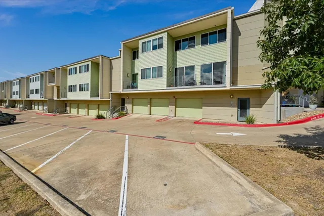 a building with trees in front of it