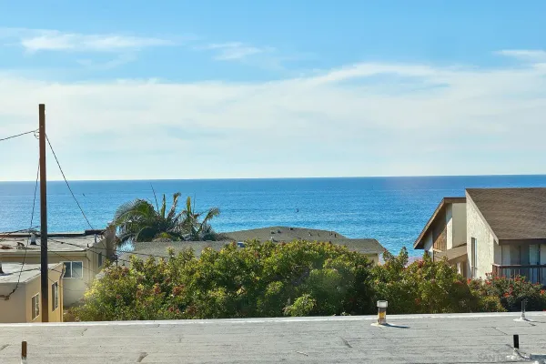 a view of an ocean from a balcony