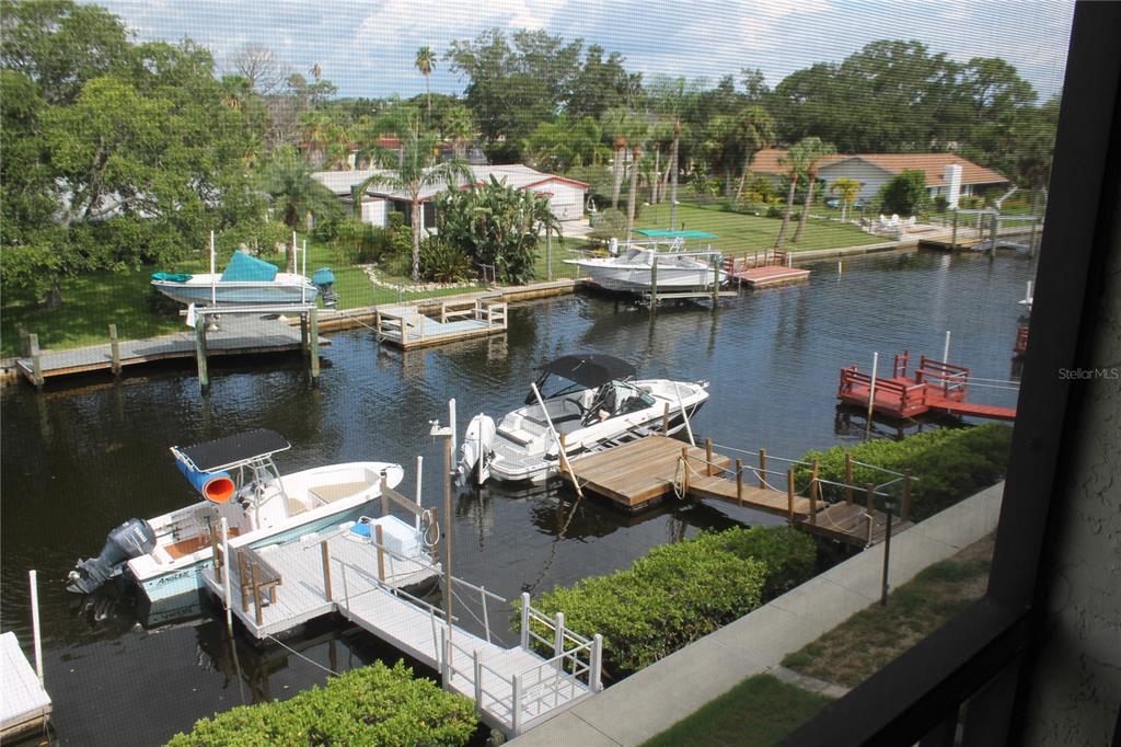 an aerial view of a house with a lake view