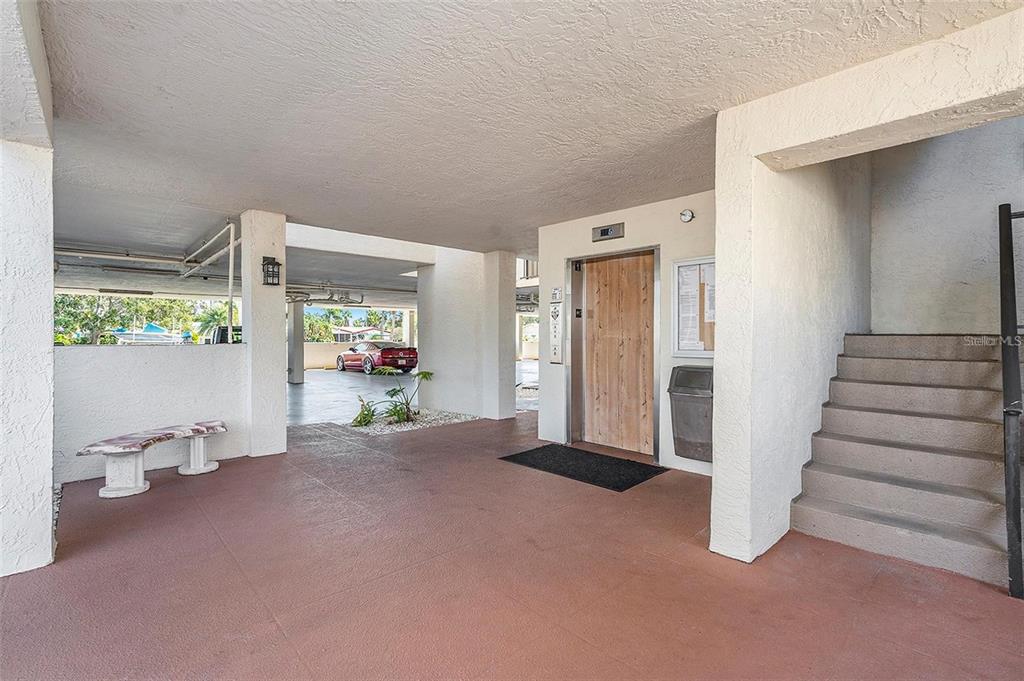 8210 Aquila Street, Unit 223 Port Richey, FL 34668 - Photo 28 of 36 wooden floor and table in a room