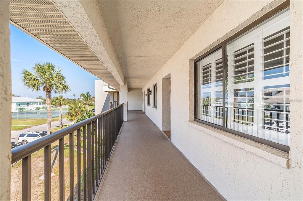 8210 Aquila Street, Unit 223 Port Richey, FL 34668 - Photo 4 of 36 a view of a balcony