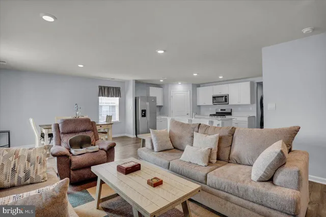 a living room with furniture and a couch