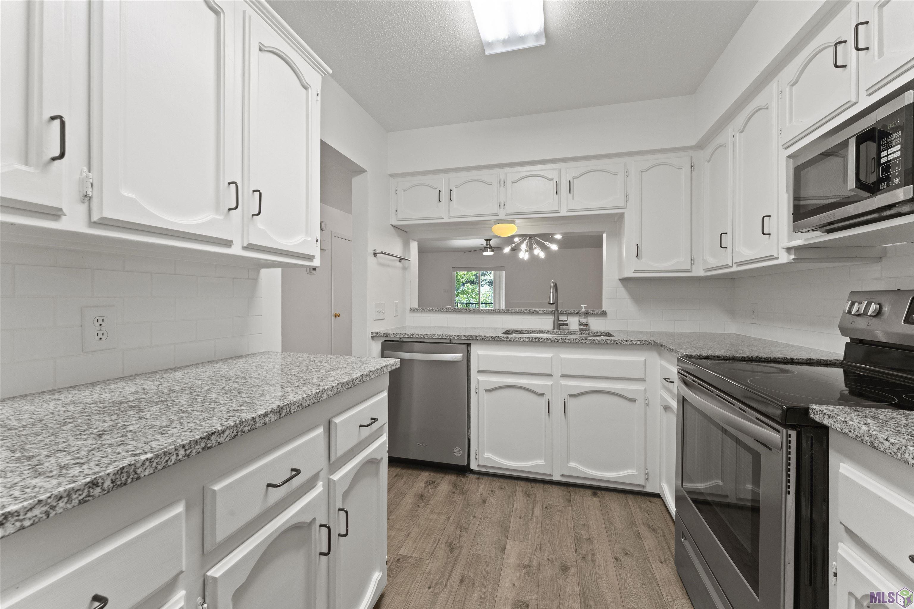 3330 Willard Street, Unit 804 Baton Rouge, LA 70802 - Photo 13 of 25 Kitchen features lots of cabinets