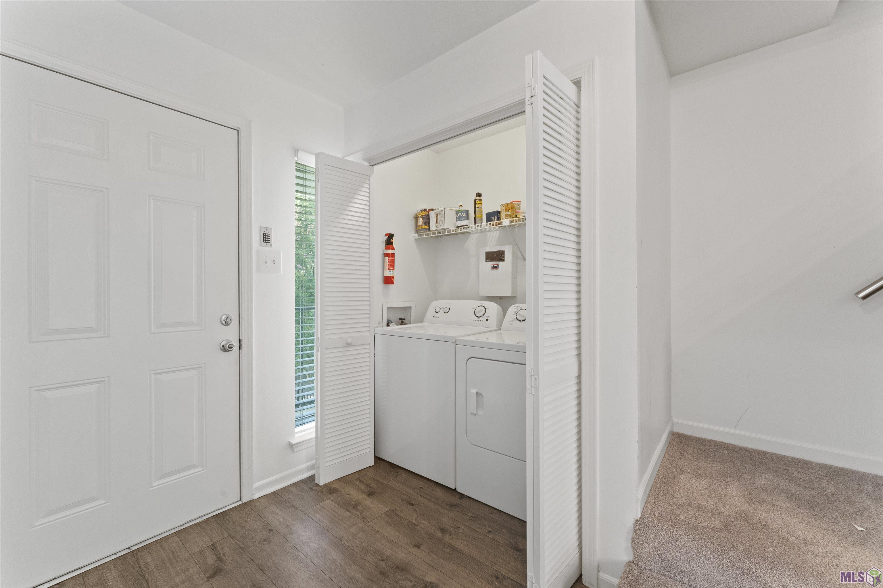 3330 Willard Street, Unit 804 Baton Rouge, LA 70802 - Photo 14 of 25 Laundry room off entrance with washer and dryer to remain