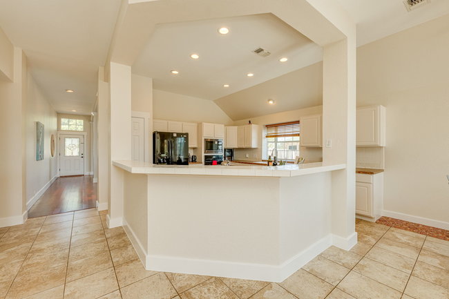 17909 Westward Look Dripping Springs, TX 78620 - Photo 13 of 40 a view of kitchen with refrigerator and sink