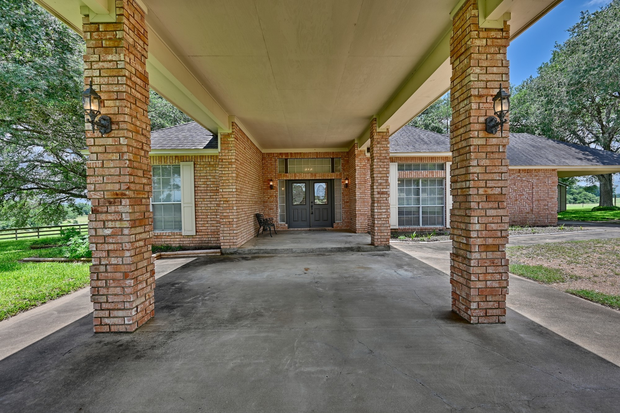 1552 Holub Road Schulenburg, TX 78956 - Photo 6 of 45 Beautiful entryway flanked by thoughtful sconces to a well crafted home.