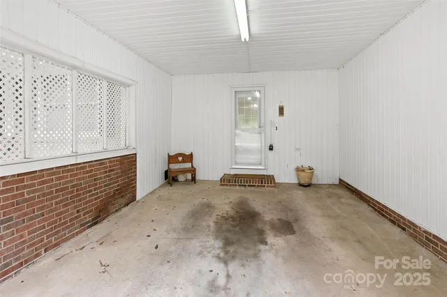 a view of a room with rack on the wall