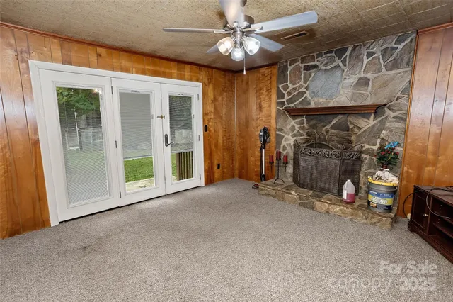 a room with a wooden floor and a cabinet