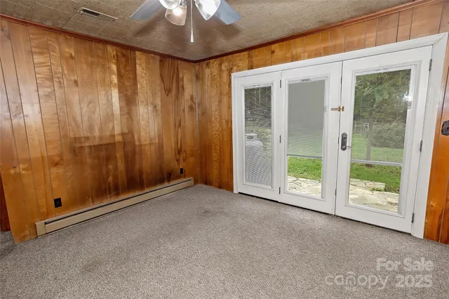 a kitchen with a refrigerator and a sink