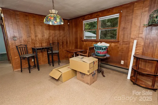 a view of a livingroom with furniture and window