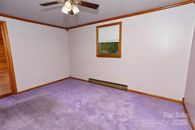 a house that has a tree in front of it