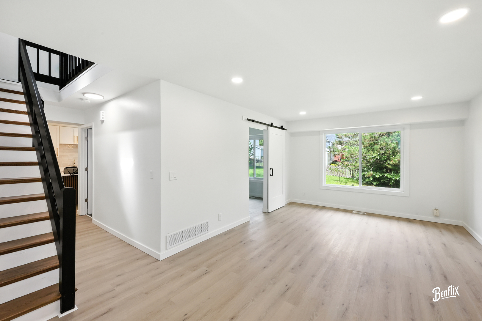 318 Exmoor Drive Streamwood, IL 60107 - Photo 2 of 26 wooden floor in an empty room with a window