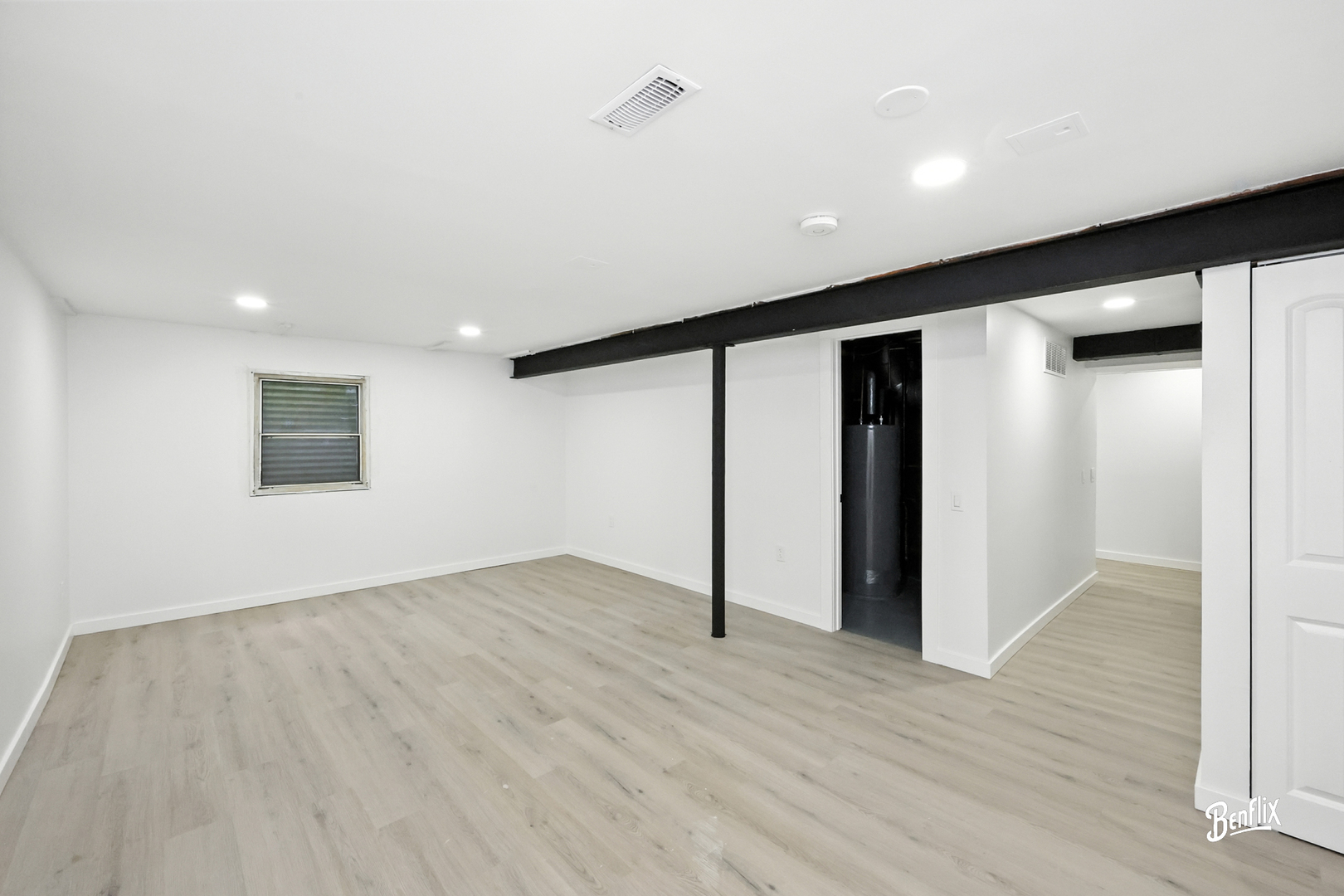 318 Exmoor Drive Streamwood, IL 60107 - Photo 22 of 26 wooden floor in an empty room with a window