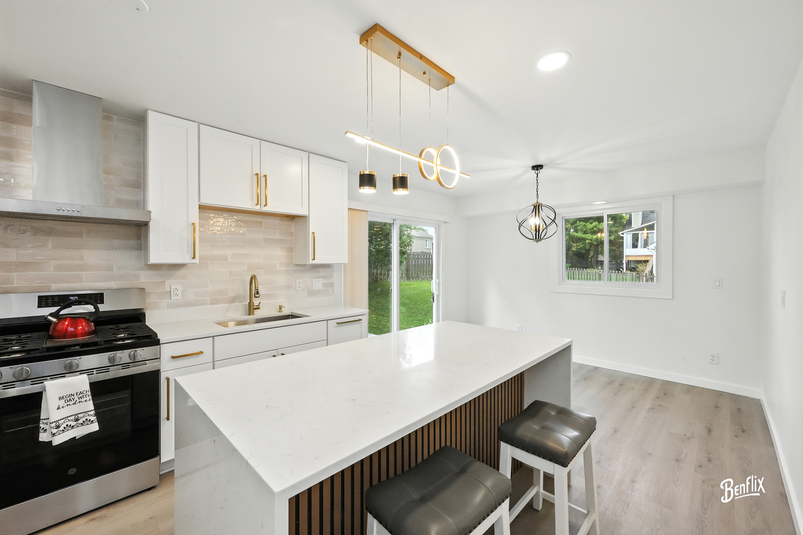 318 Exmoor Drive Streamwood, IL 60107 - Photo 5 of 26 a kitchen with a stove a sink and a refrigerator