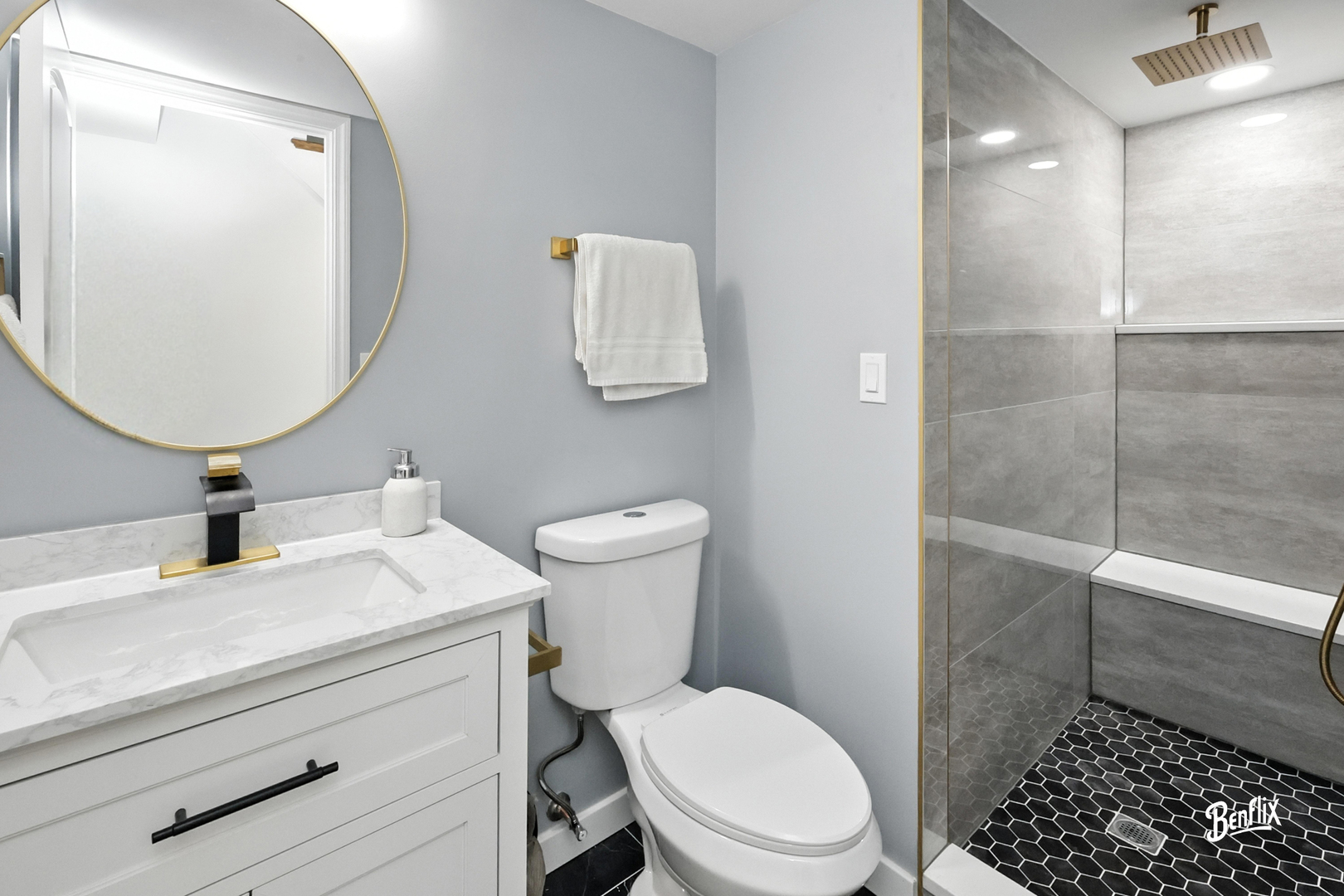 318 Exmoor Drive Streamwood, IL 60107 - Photo 10 of 26 a bathroom with a sink a toilet and shower