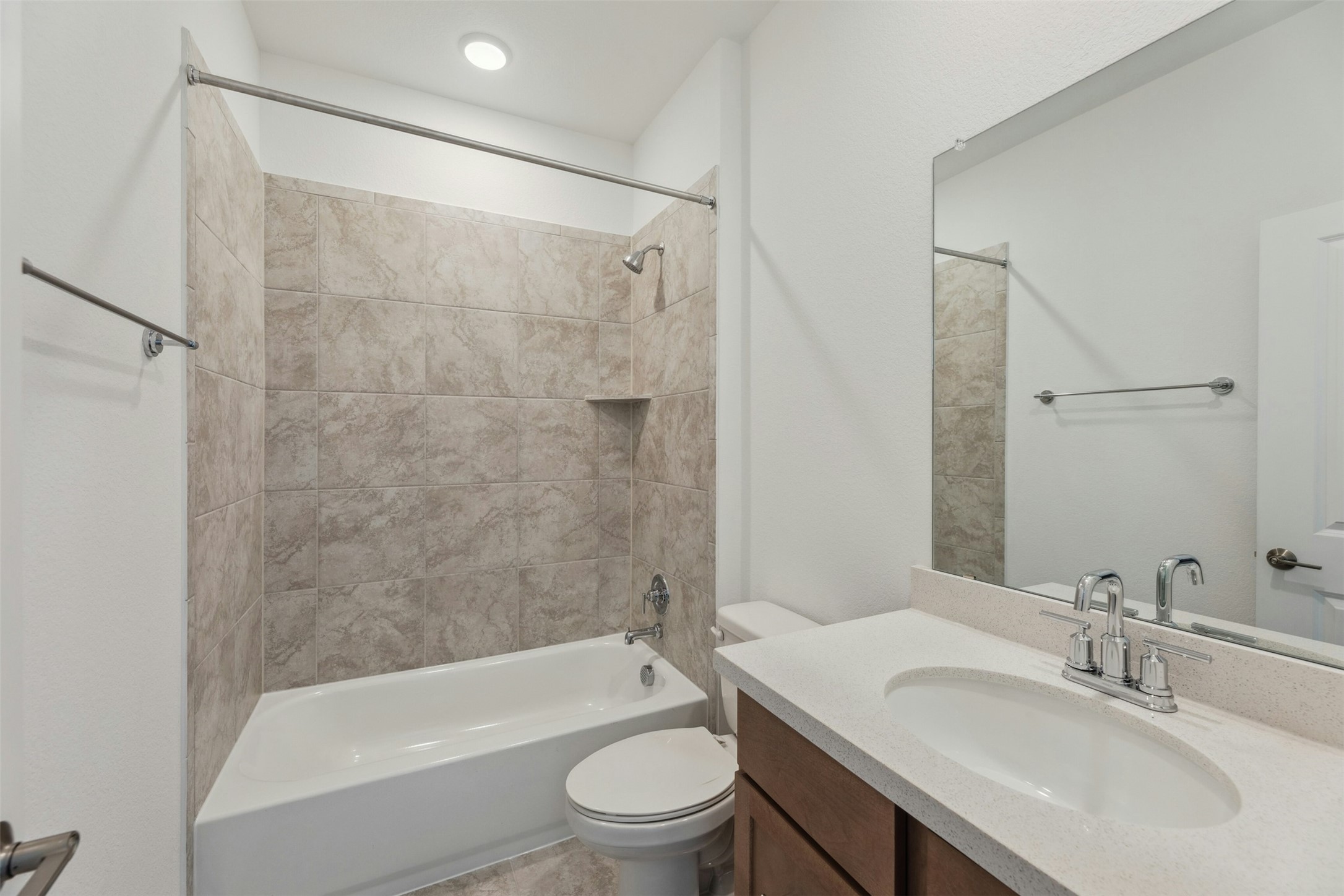 2001 Wynn Road Hutto, TX 78634 - Photo 21 of 39 A well-appointed bath with tiled shower and ample counter space awaits.