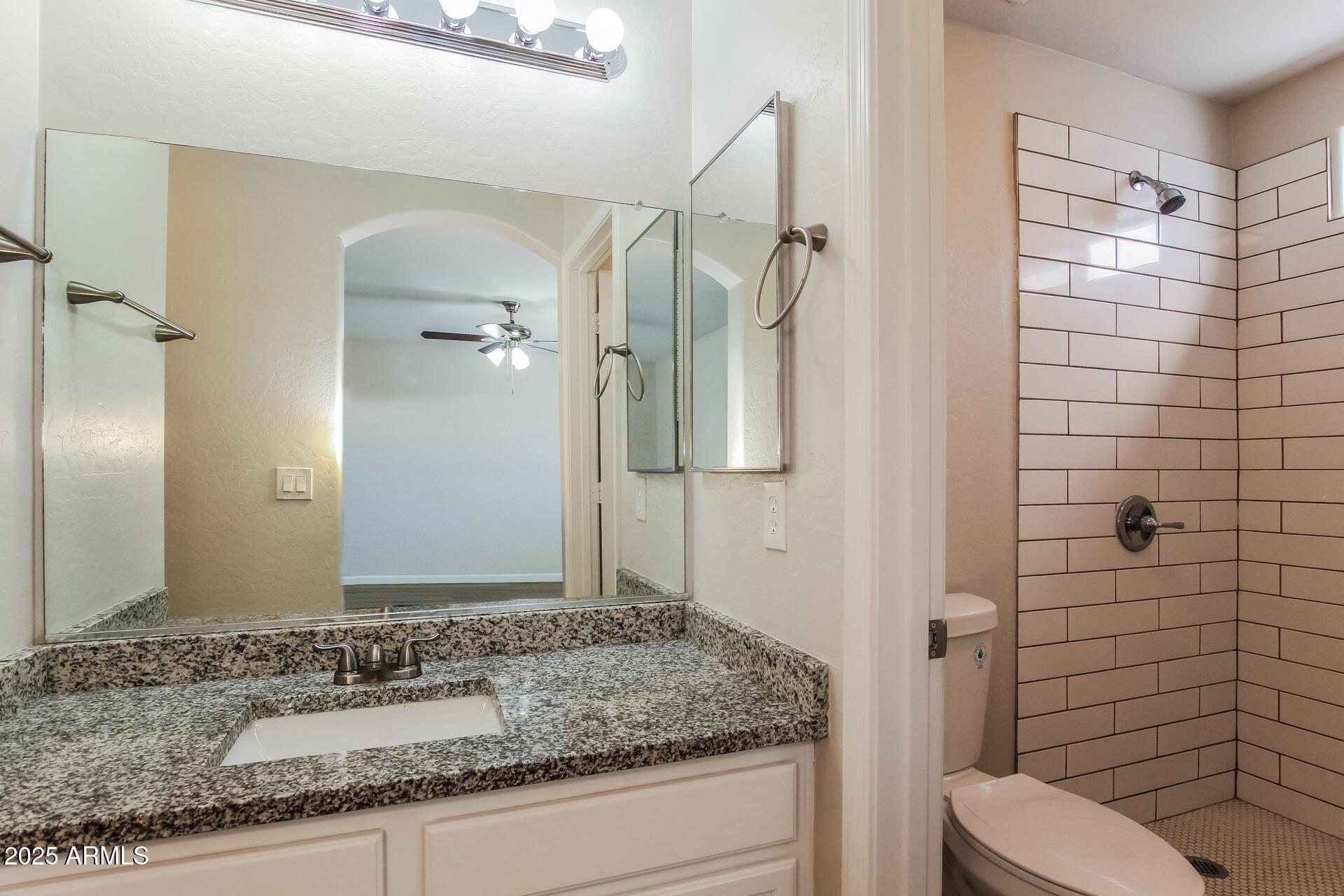 3323 West Fraktur Road Phoenix, AZ 85041 - Photo 12 of 26 012-photo-main-bathroom-14395469