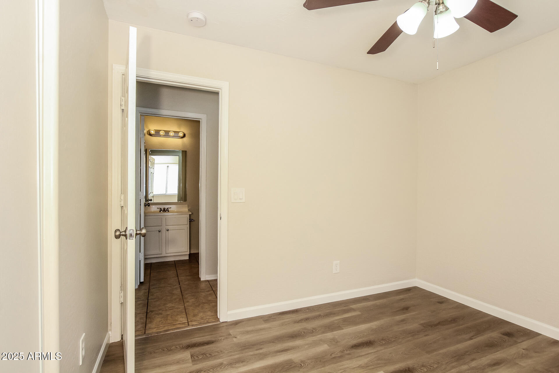 3323 West Fraktur Road Phoenix, AZ 85041 - Photo 18 of 26 018-photo-bedroom-14395475
