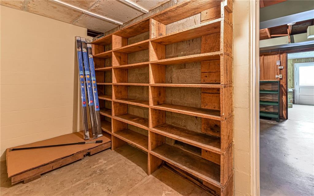 830 Hartzell School Road New Brighton, PA 15066 - Photo 26 of 31 a view of an empty room with wooden floor and a window
