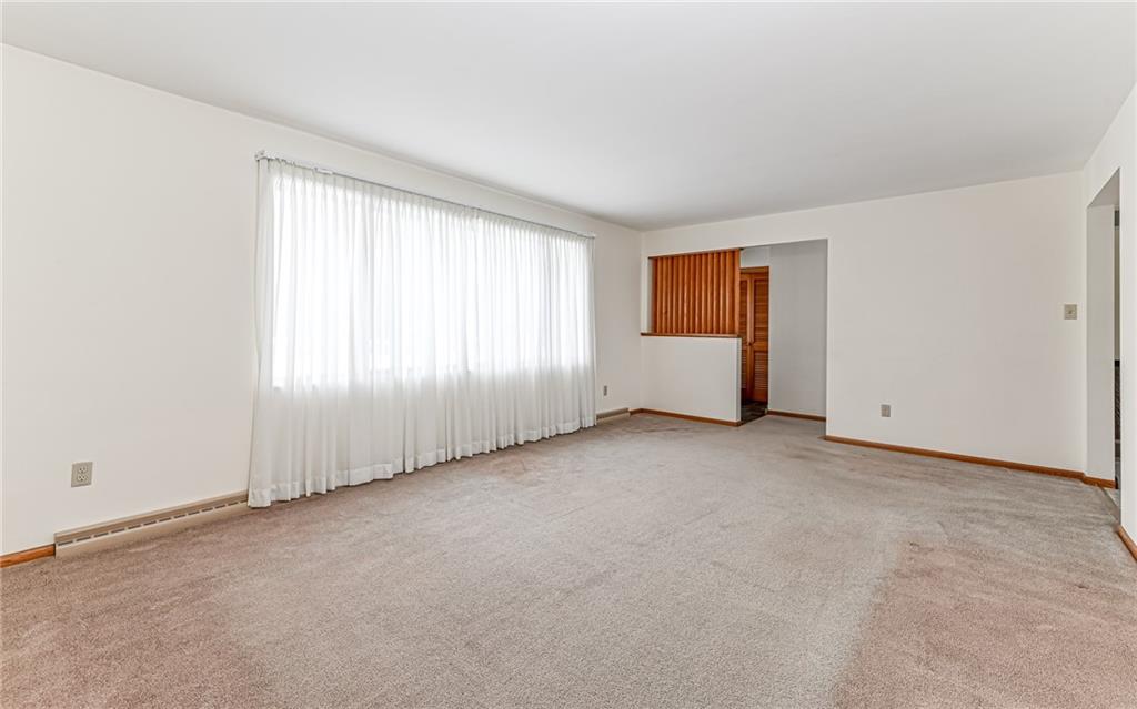 830 Hartzell School Road New Brighton, PA 15066 - Photo 5 of 31 an empty room with windows