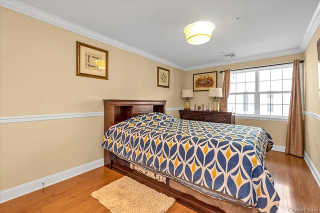 a kitchen that has a lot of cabinets in it and appliances