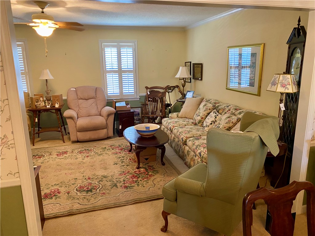 2026 Cardinal Park Drive Anderson, SC 29621 - Photo 12 of 41 This inviting living space features warm lighting and a comfortable layout perfect for relaxation.