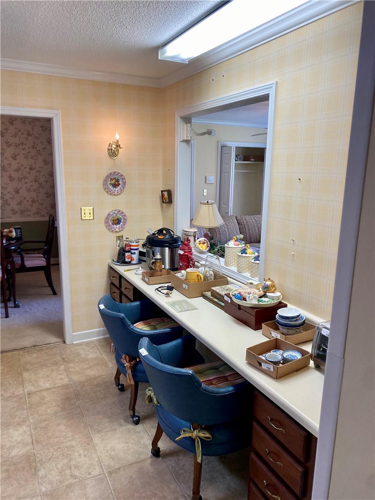 2026 Cardinal Park Drive Anderson, SC 29621 - Photo 17 of 41 This kitchen area features convenient counter space and seamless flow into adjacent rooms.