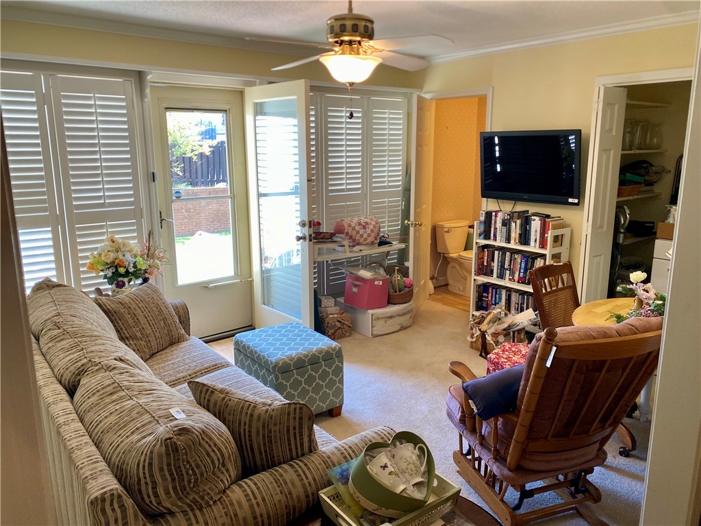 2026 Cardinal Park Drive Anderson, SC 29621 - Photo 22 of 41 This living area features ample natural light, creating an inviting and bright atmosphere.