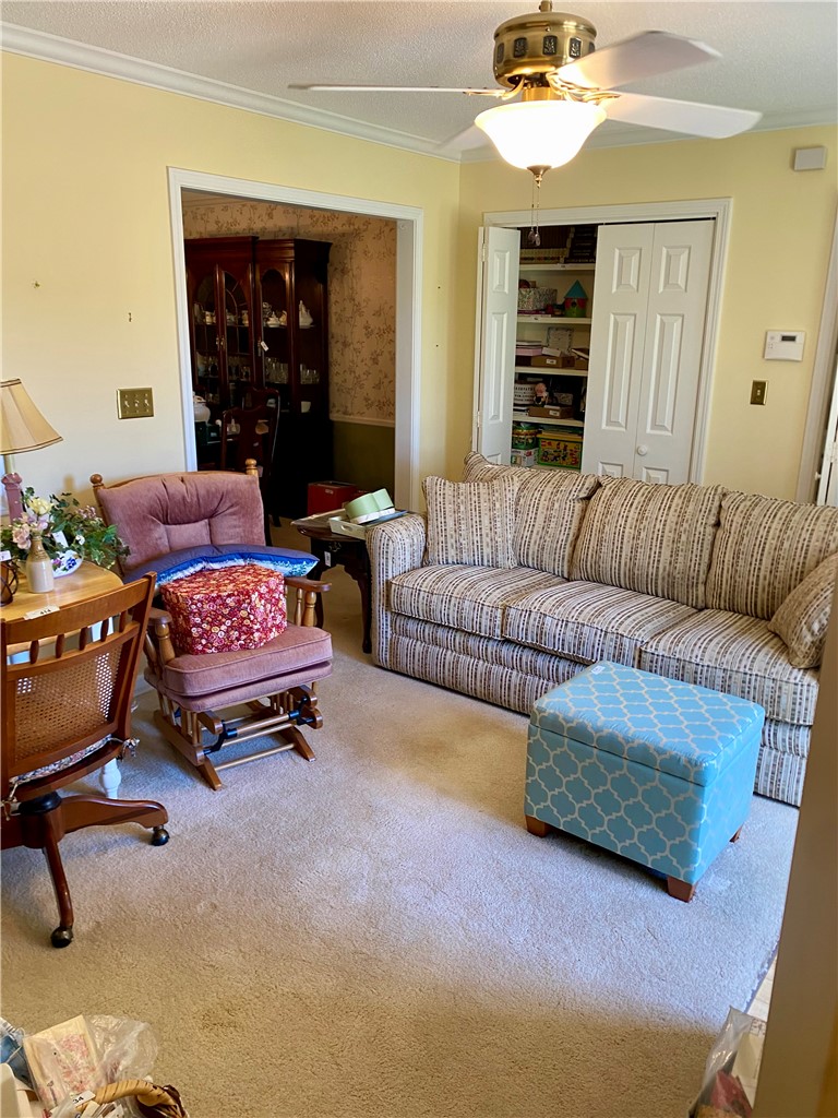 2026 Cardinal Park Drive Anderson, SC 29621 - Photo 23 of 41 This inviting space features comfortable carpeting and a convenient ceiling fan for year-round comfort.