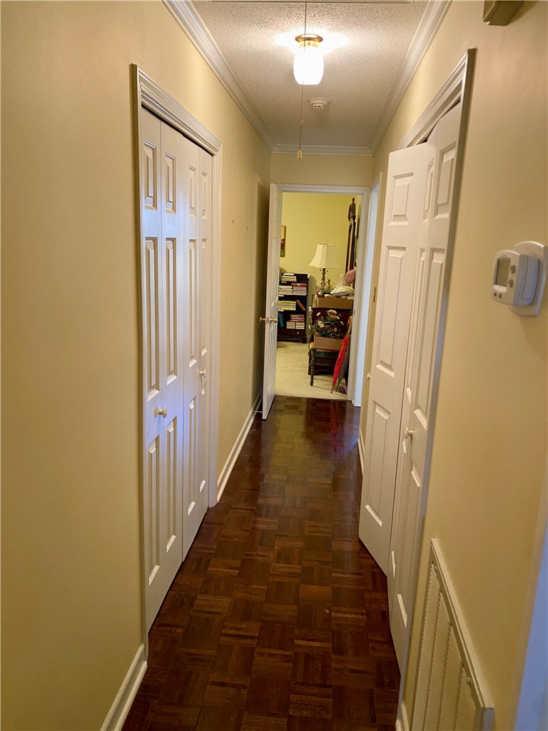 2026 Cardinal Park Drive Anderson, SC 29621 - Photo 33 of 41 This inviting hallway features rich wood flooring, leading to other well-appointed rooms.