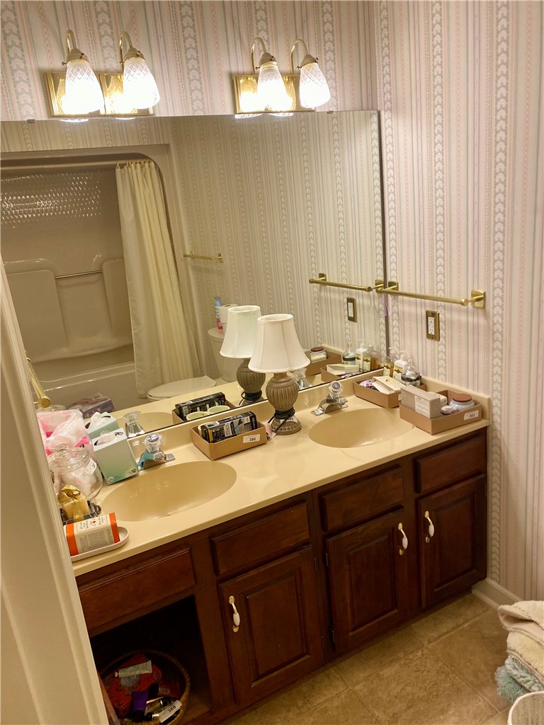 2026 Cardinal Park Drive Anderson, SC 29621 - Photo 36 of 41 This bathroom features a double vanity with ample counter space and a large mirror.