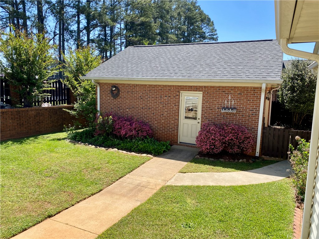 2026 Cardinal Park Drive Anderson, SC 29621 - Photo 7 of 41 This private backyard structure offers convenience and charm, ideal for a studio or storage.