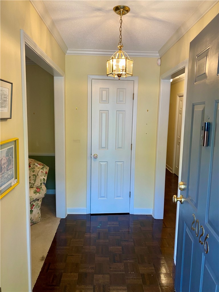 2026 Cardinal Park Drive Anderson, SC 29621 - Photo 9 of 41 Step into this welcoming entryway featuring warm flooring and classic overhead lighting.