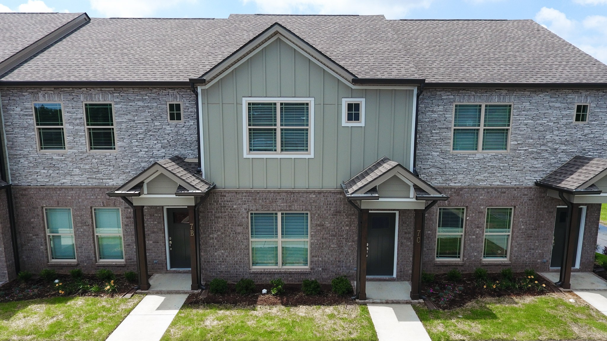 555 Gresham Lane, Unit 7C Murfreesboro, TN 37128 - Photo 2 of 19 front view of a house with a yard