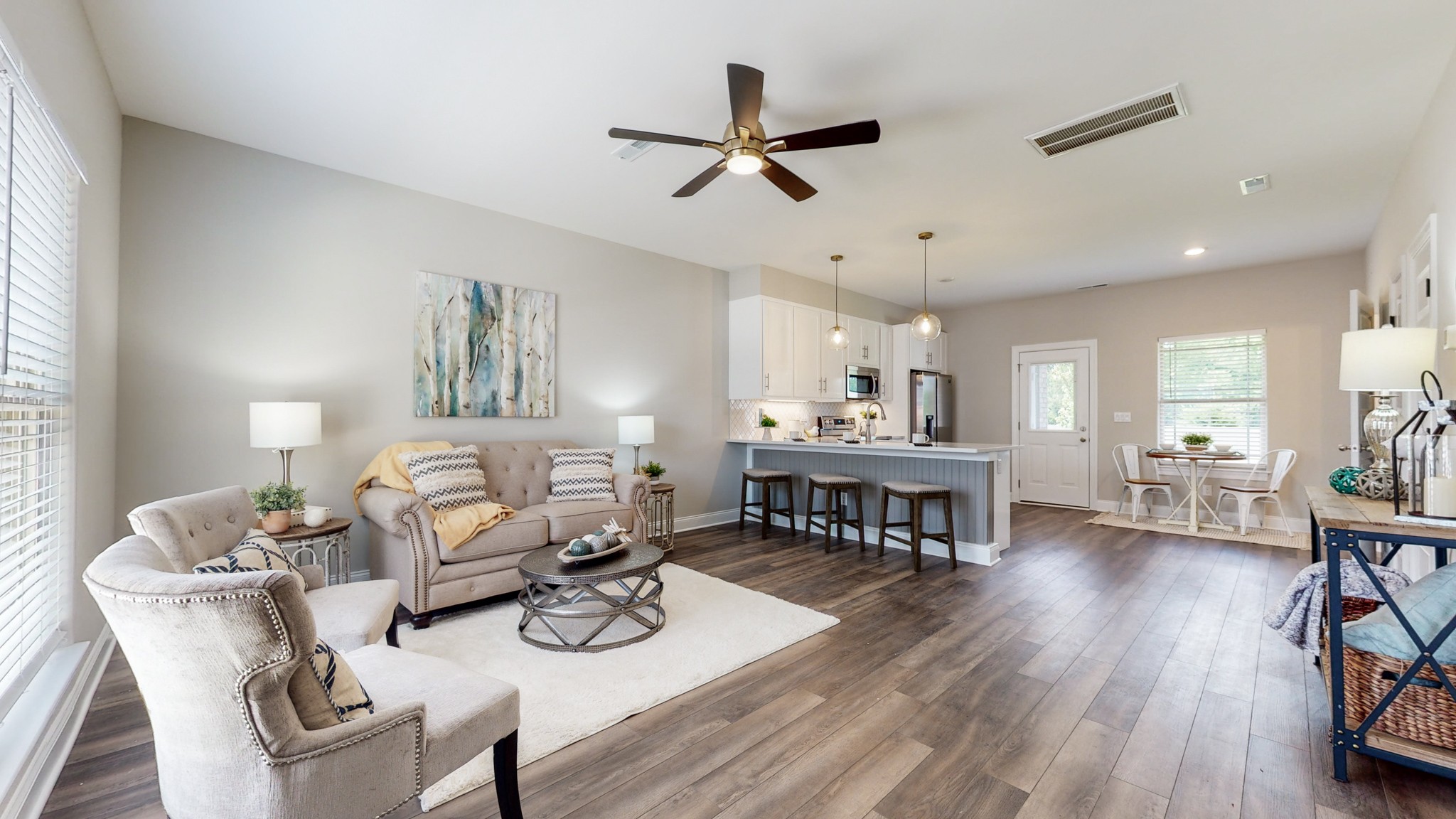 555 Gresham Lane, Unit 7C Murfreesboro, TN 37128 - Photo 3 of 19 a living room with furniture and a wooden floor