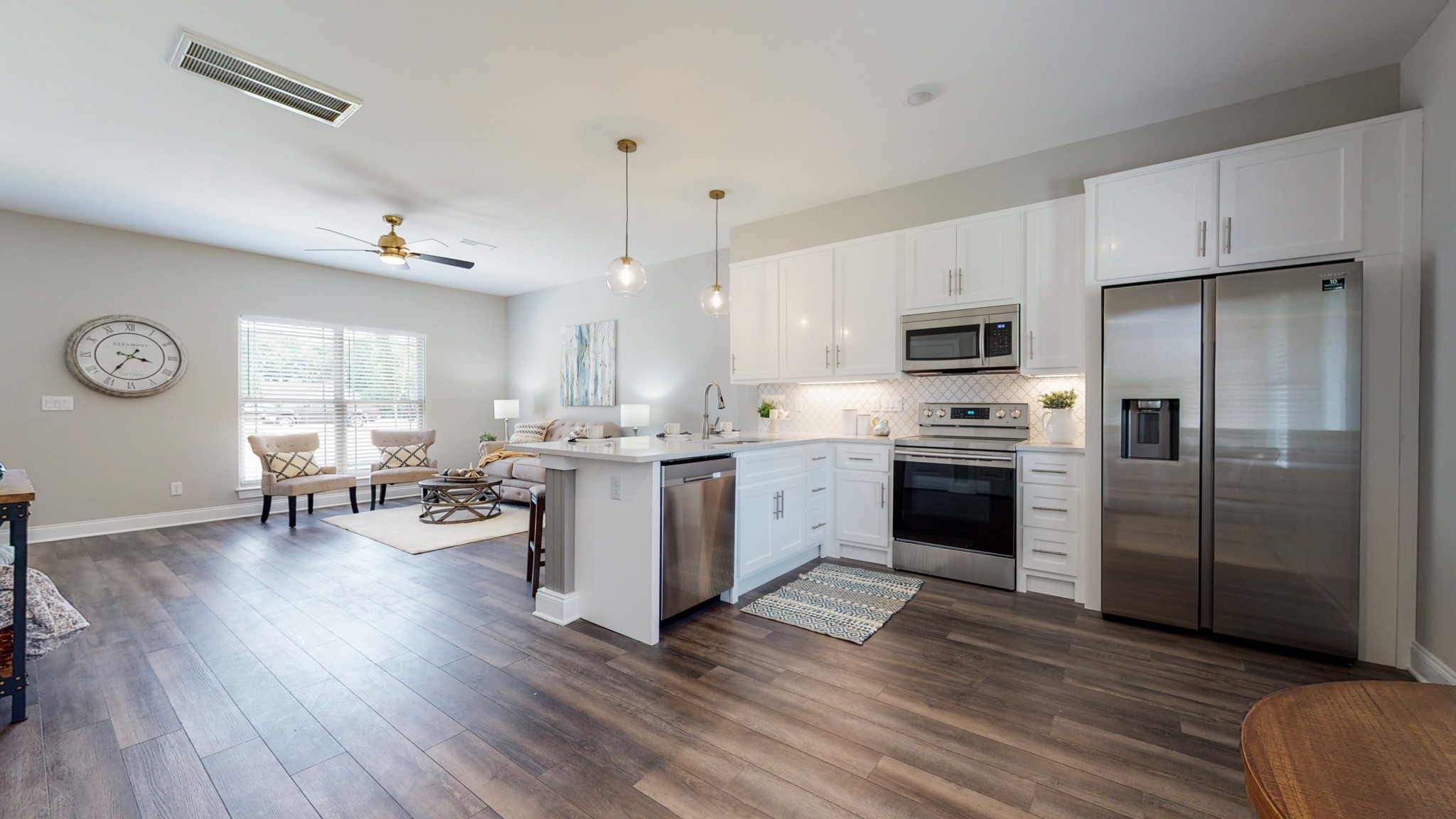 555 Gresham Lane, Unit 7C Murfreesboro, TN 37128 - Photo 7 of 19 a kitchen with a sink stainless steel appliances and cabinets