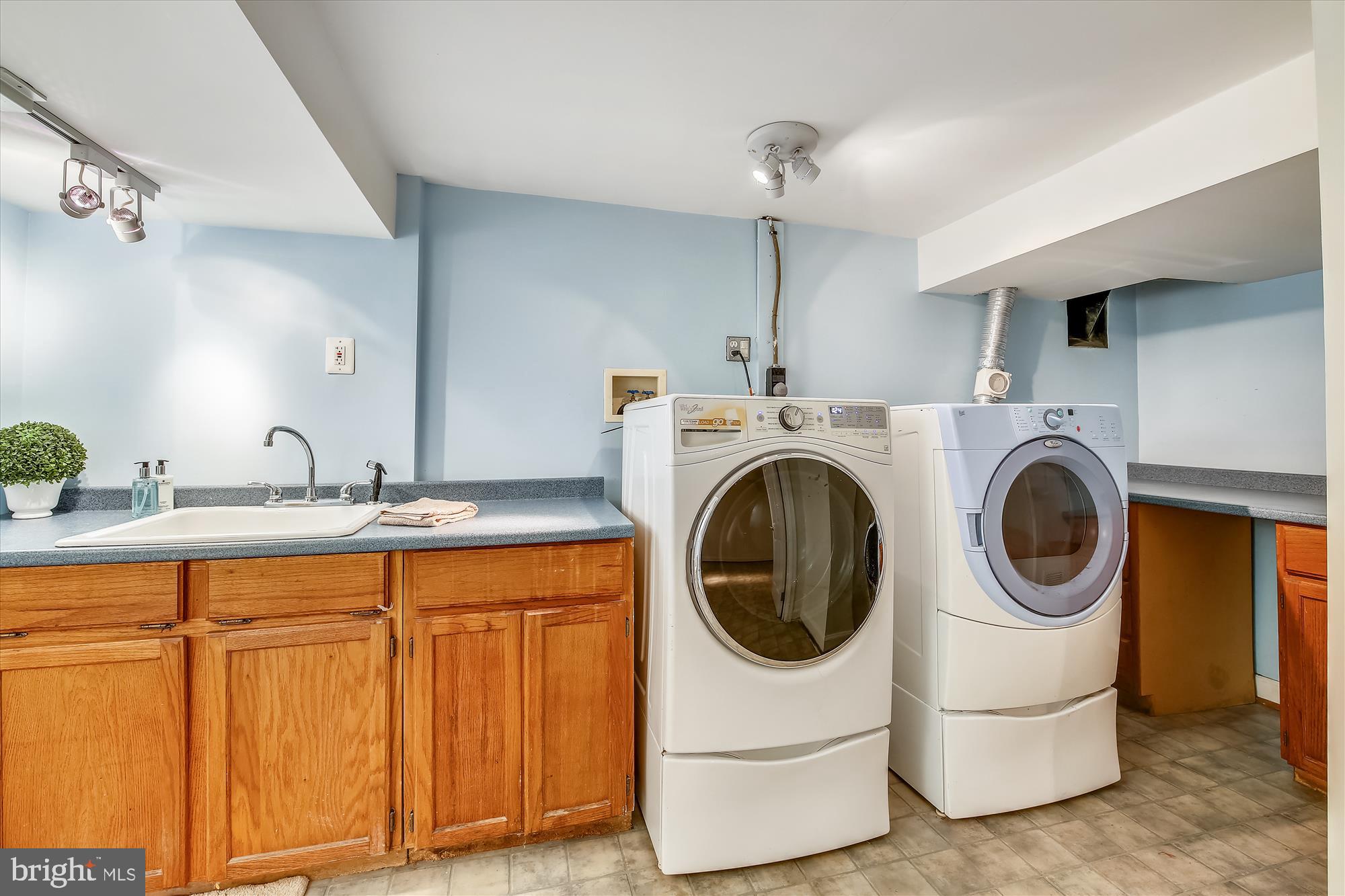 2112 Cascade Road Silver Spring, MD 20902 - Photo 45 of 88 Lower Level Half Bath with Laundry Room