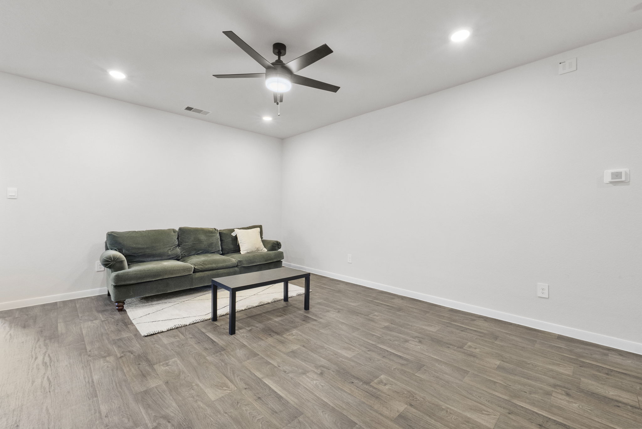 320 Darwin Place Lockhart, TX 78644 - Photo 18 of 31 Sitting room featuring recessed lighting, ceiling fan, and wood finished floors