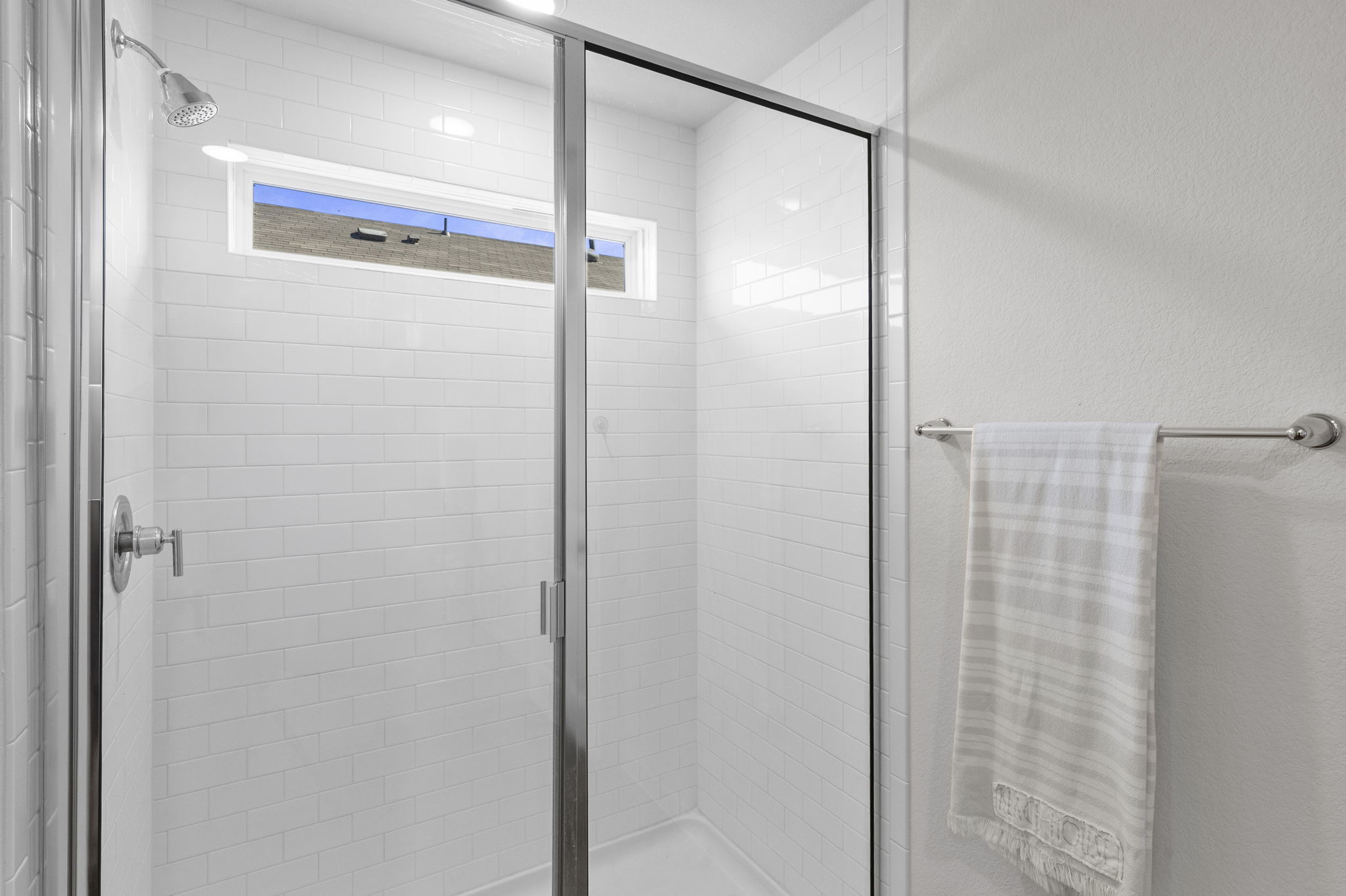 320 Darwin Place Lockhart, TX 78644 - Photo 25 of 31 Full bathroom featuring a shower stall and a textured wall
