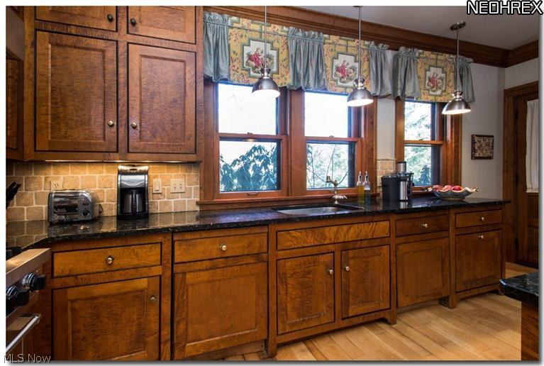2957 Sedgewick Road Cleveland, OH 44120 - Photo 7 of 25 Additional cabinetry with twin Bosch dishwashers and oversized stainless sink.