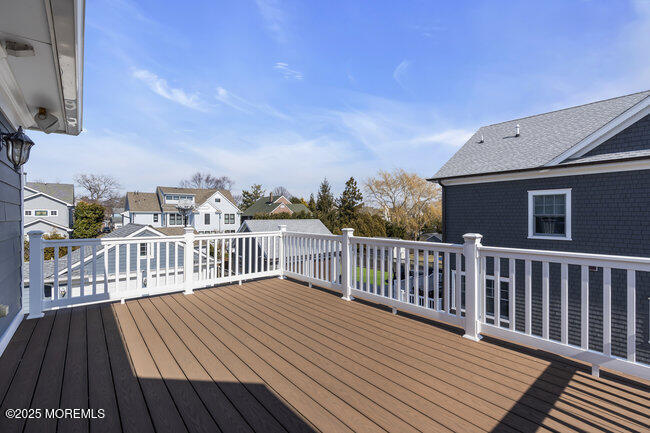 Undisclosed Address Spring Lake, NJ 07762 - Photo 34 of 67 a view of balcony with wooden floor