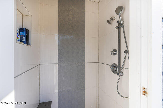 Undisclosed Address Spring Lake, NJ 07762 - Photo 56 of 67 a bathroom with a shower