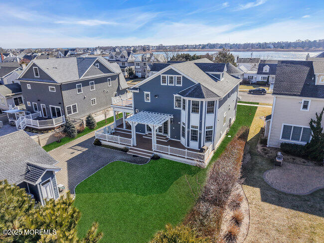 Undisclosed Address Spring Lake, NJ 07762 - Photo 60 of 67 an aerial view of a house with a garden