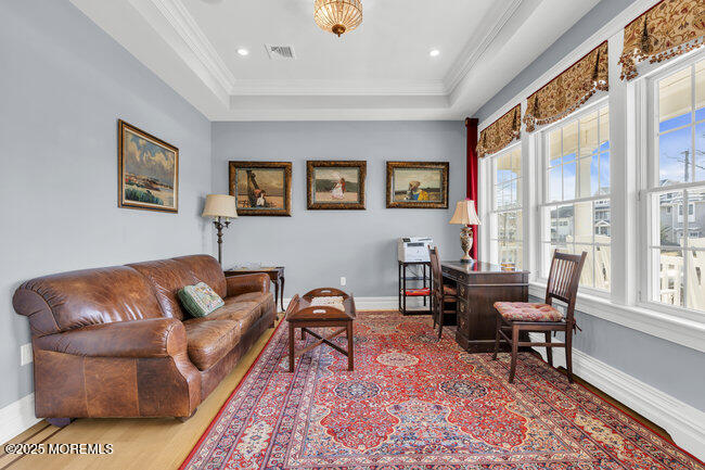 Undisclosed Address Spring Lake, NJ 07762 - Photo 6 of 67 a living room with furniture and a large window