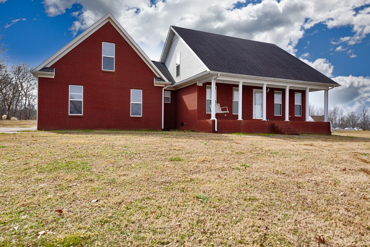 168 Lake Logan Road Ardmore, TN 38449 - Photo 1 of 27 a front view of a house with a yard
