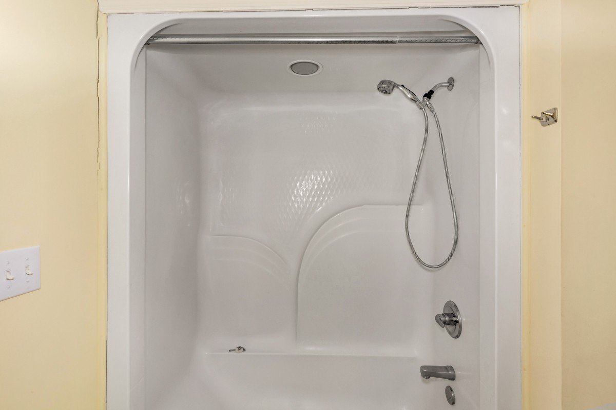 168 Lake Logan Road Ardmore, TN 38449 - Photo 14 of 27 a bathroom with a shower